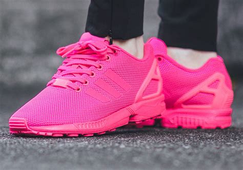 pink adidas sneakers|bright pink Adidas sneakers.